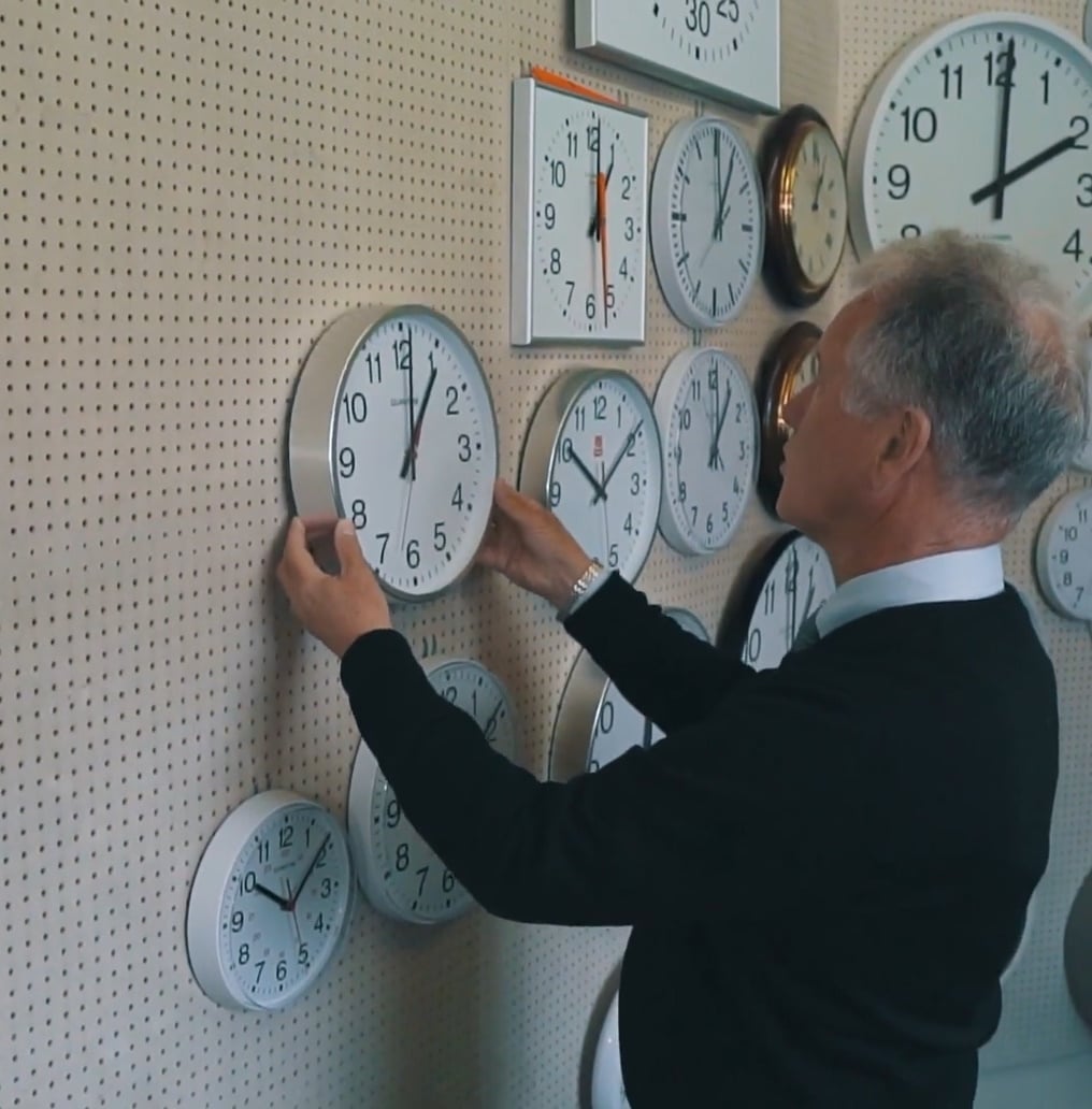 Man Fitting Clock